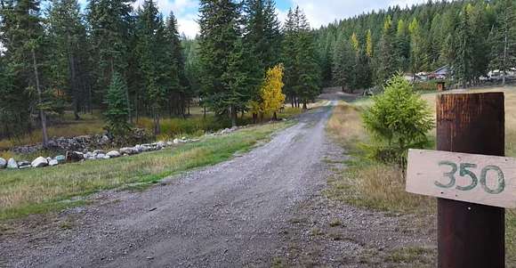18.1 Acres of Recreational Land with Home for Sale in Kila, Montana