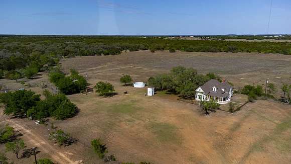 148 Acres of Agricultural Land with Home for Sale in Bertram, Texas