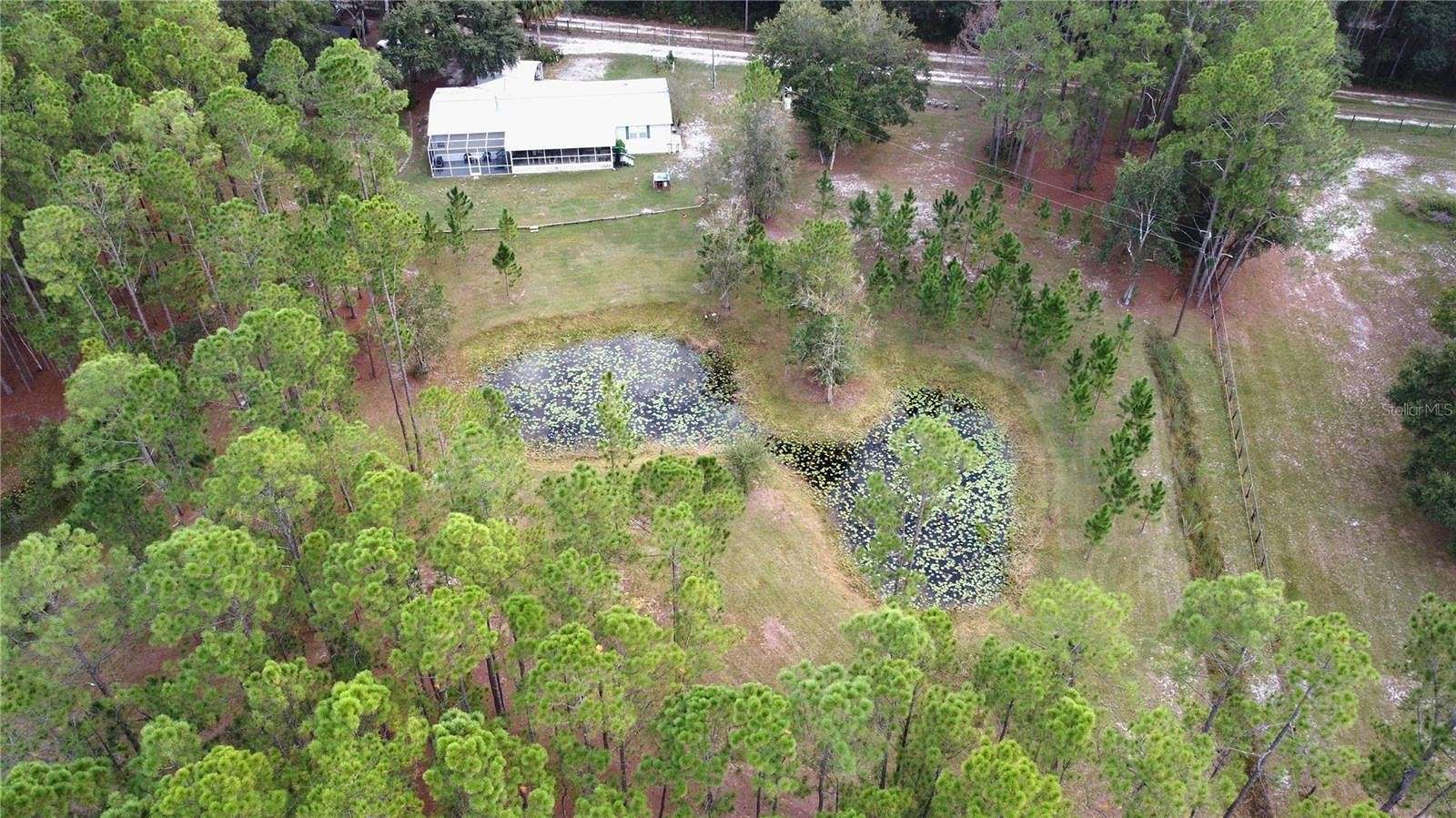 7.2 Acres of Residential Land with Home for Sale in Citra, Florida