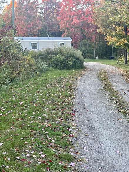 13.3 Acres of Land with Home for Sale in Chateaugay, New York