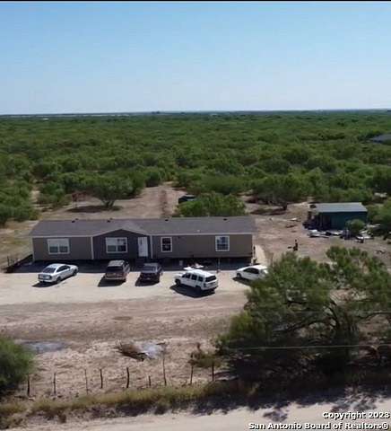 10.3 Acres of Land with Home for Sale in La Pryor, Texas
