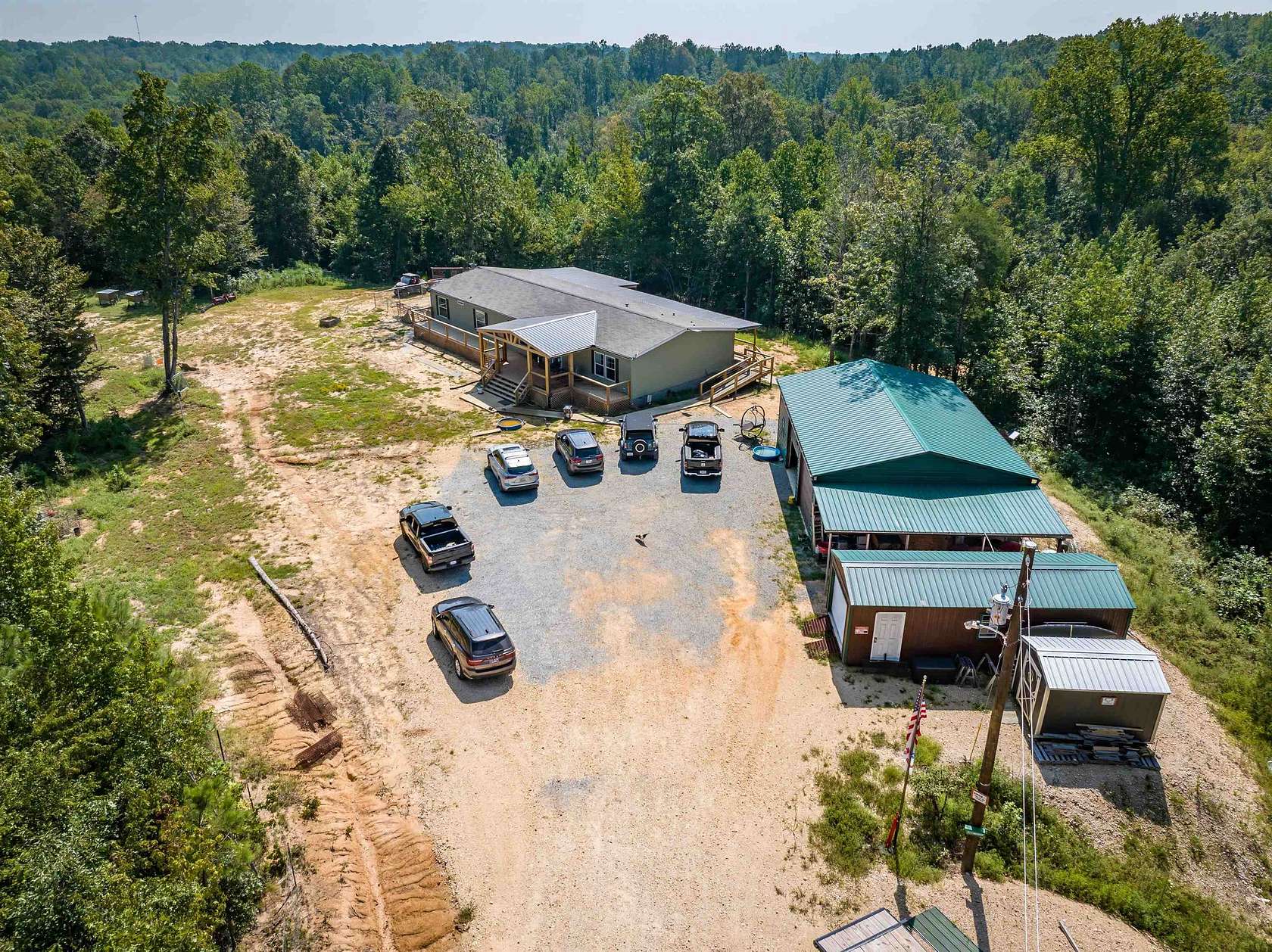 73 Acres of Recreational Land with Home for Sale in Camden, Tennessee