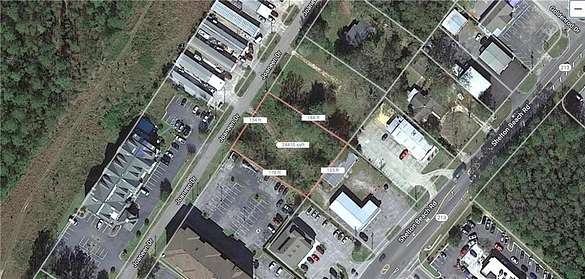 0.56 Acres of Commercial Land for Sale in Saraland, Alabama