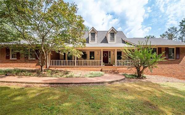 10.8 Acres of Land with Home for Sale in Powder Springs, Georgia