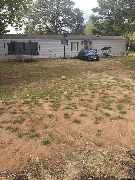 12 Acres of Land with Home for Sale in Jacksonville, Texas