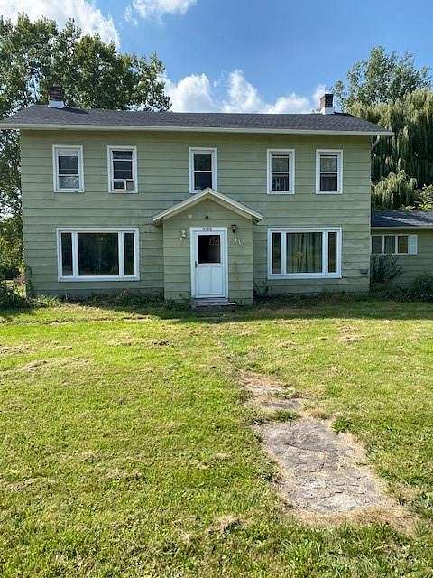 2.3 Acres of Residential Land with Home for Sale in Medina, New York