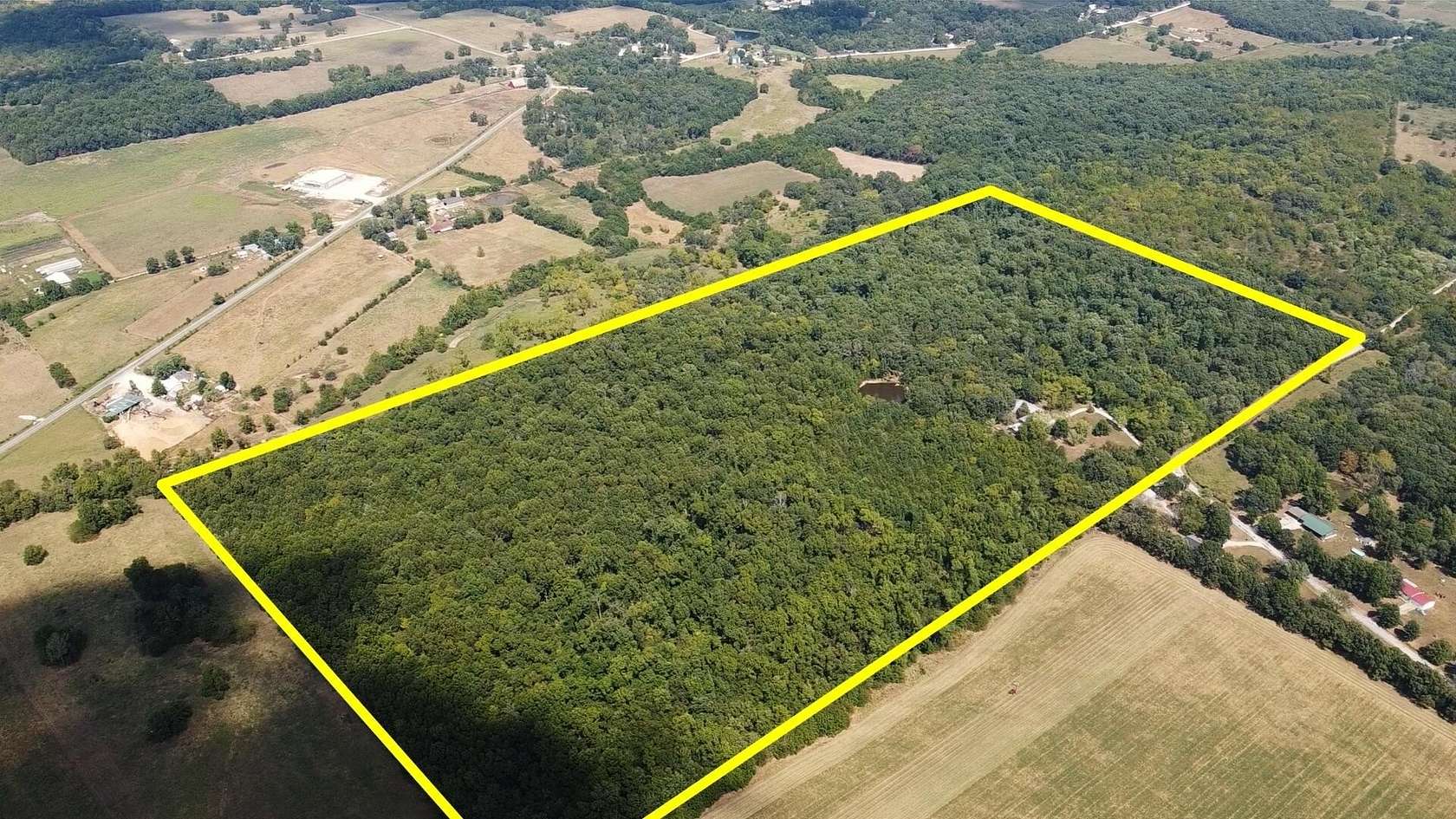 80 Acres of Recreational Land with Home for Sale in Dunnegan, Missouri