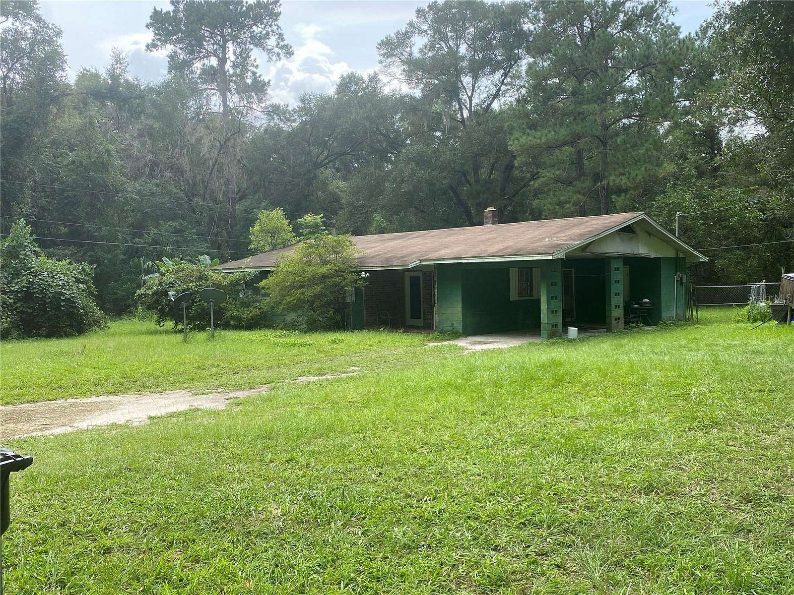 2.1 Acres of Residential Land with Home for Sale in Gainesville, Florida