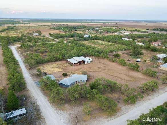 2.3 Acres of Residential Land with Home for Sale in Millersview, Texas