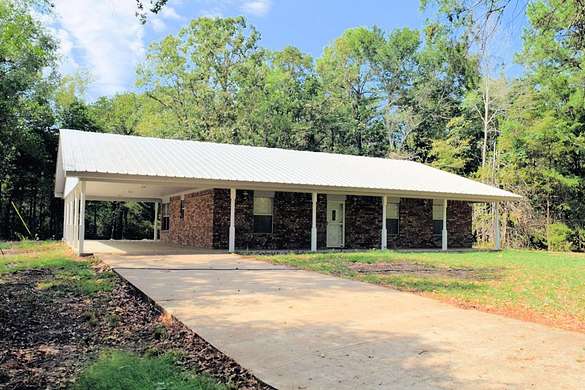 15.2 Acres of Land with Home for Sale in Palestine, Texas