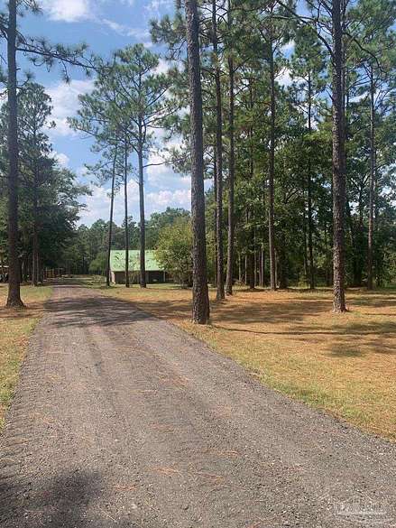 4.7 Acres of Residential Land with Home for Sale in Cantonment, Florida