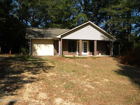 19.2 Acres of Land with Home for Sale in Magee, Mississippi