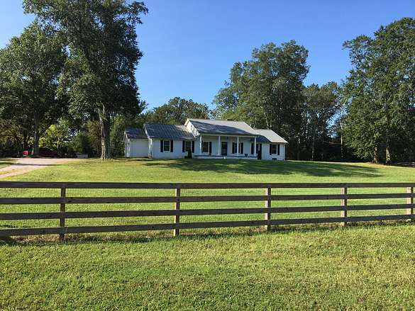 4.8 Acres of Land with Home for Sale in Adamsville, Tennessee