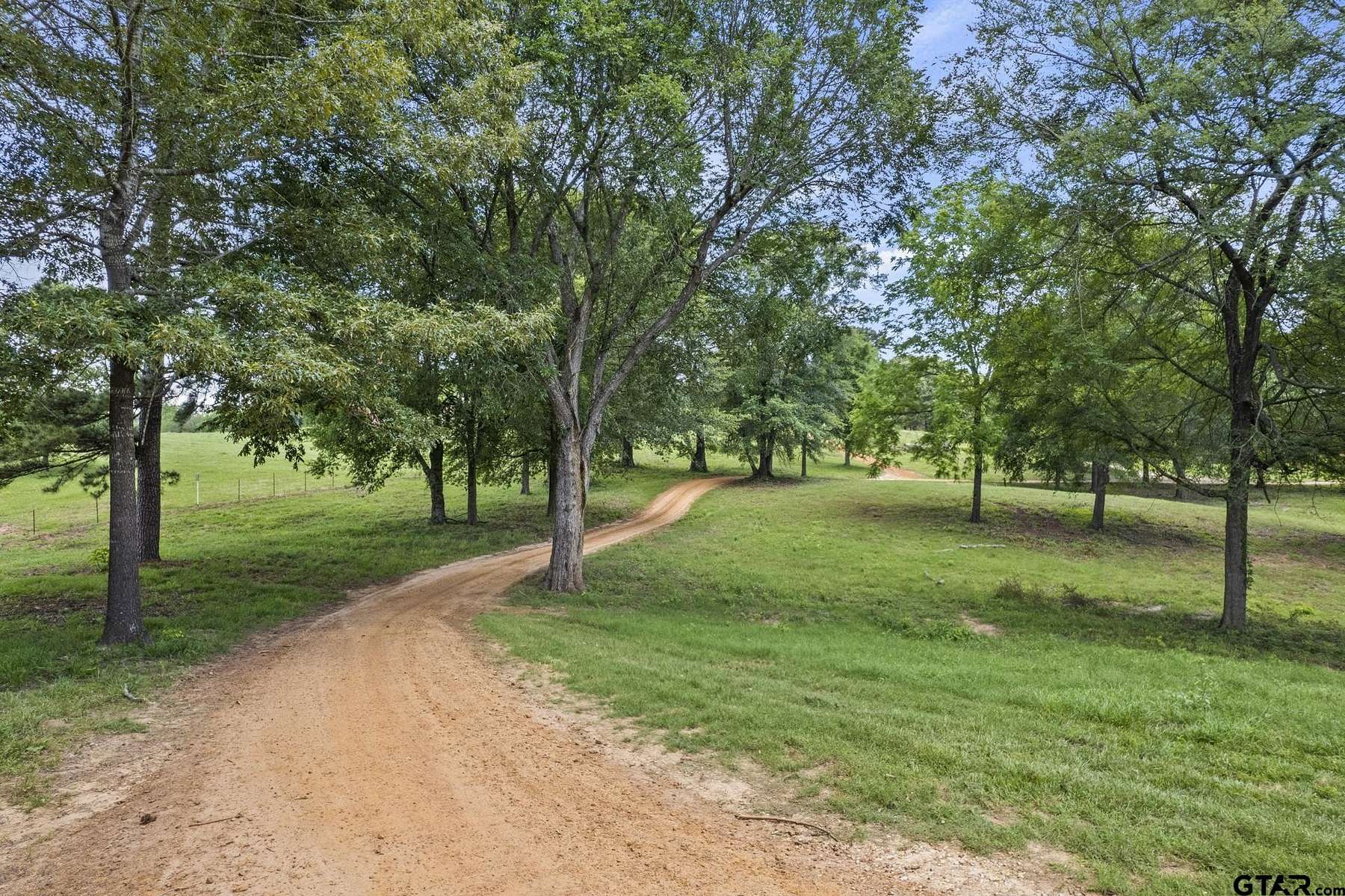 106 Acres of Agricultural Land with Home for Sale in Gilmer, Texas