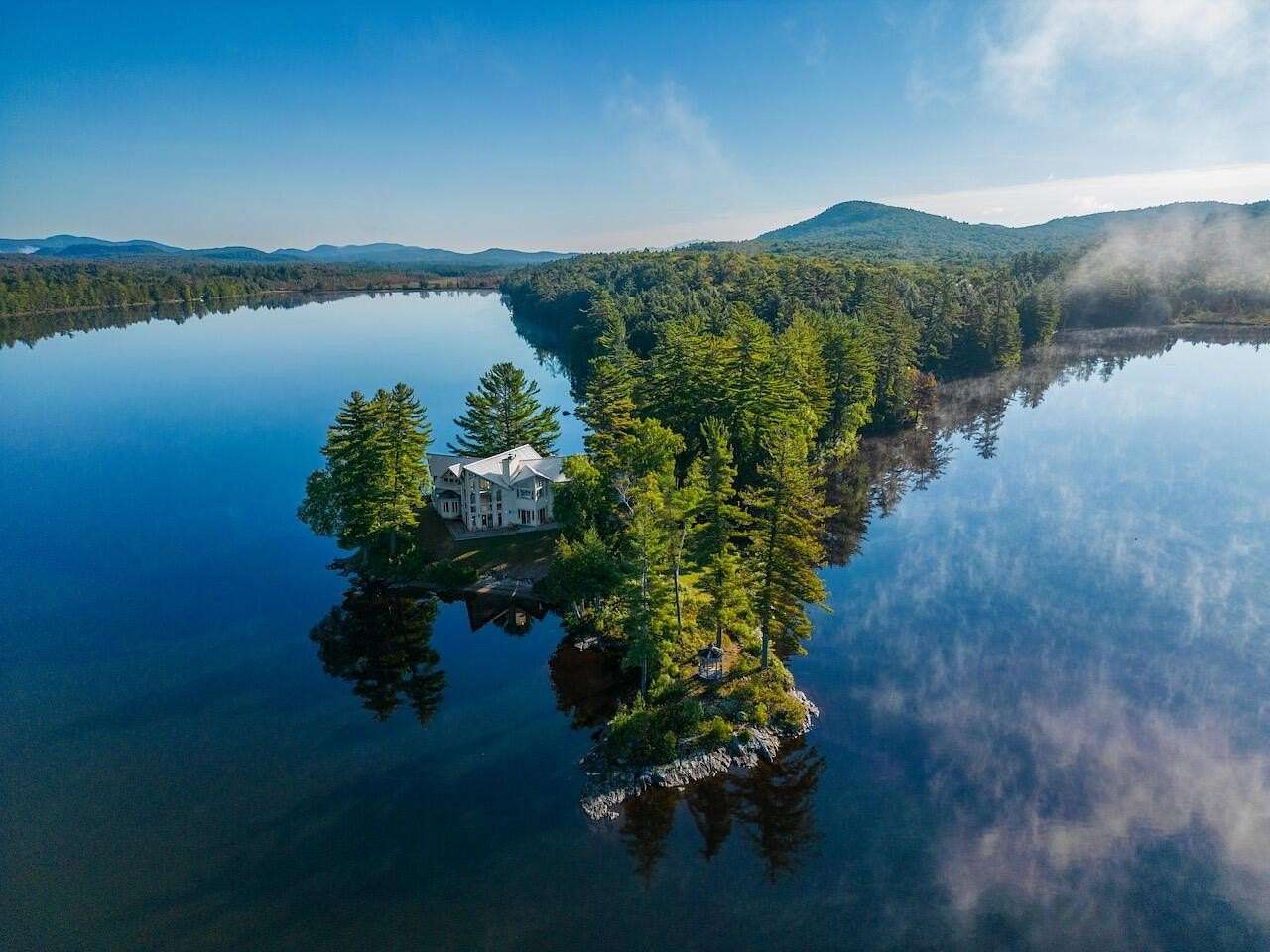 130 Acres of Land with Home for Sale in Long Lake, New York