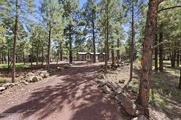 3.3 Acres of Residential Land with Home for Sale in Parks, Arizona