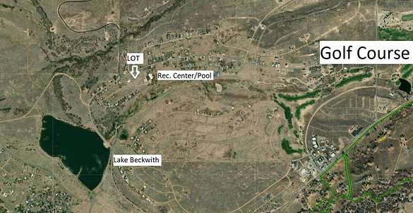 Lot is between Lake Beckwith and Hollydot Golf Course with Rec. Center Across the Road
