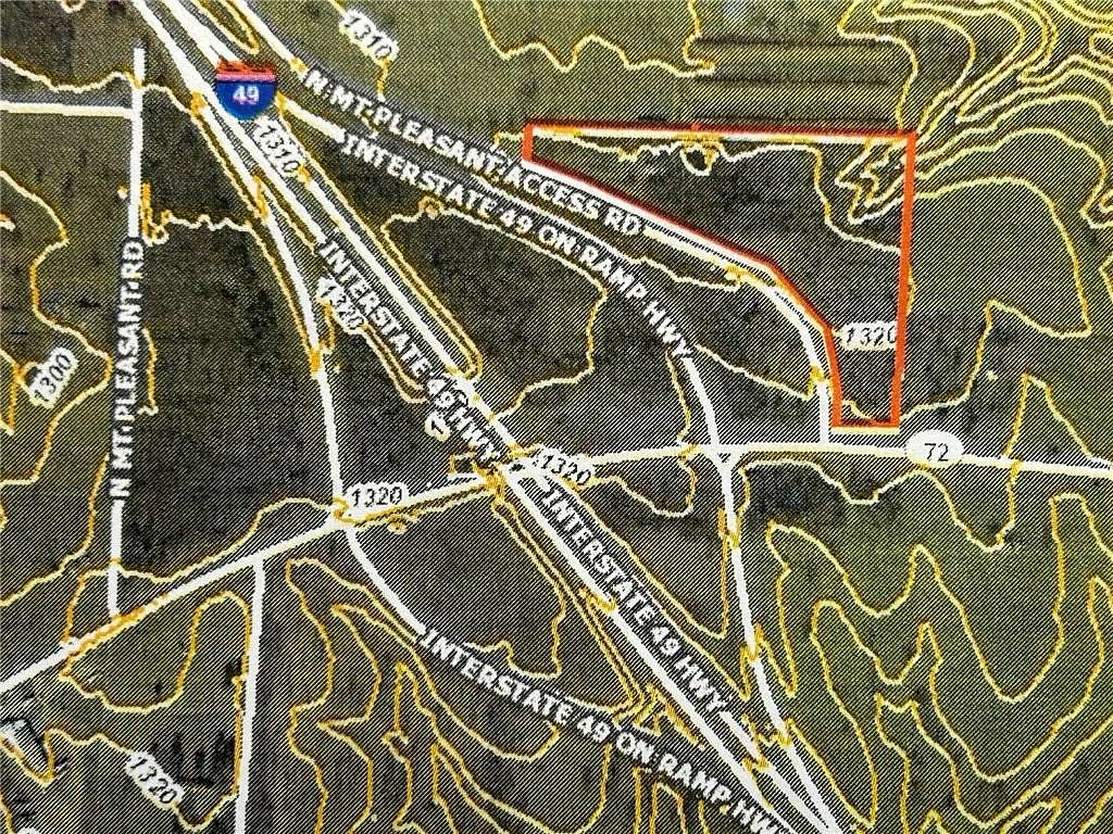 13.2 Acres of Commercial Land for Sale in Gravette, Arkansas