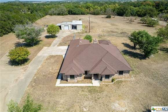 12.2 Acres of Land with Home for Sale in Kempner, Texas