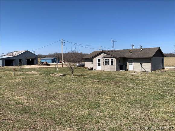 10.7 Acres of Land with Home for Sale in Roach, Missouri