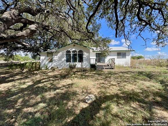 22 Acres of Land with Home for Sale in Devine, Texas