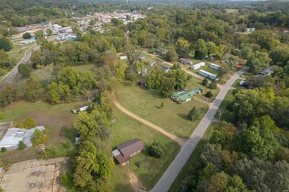 6.7 Acres of Residential Land with Home for Sale in Piedmont, Missouri