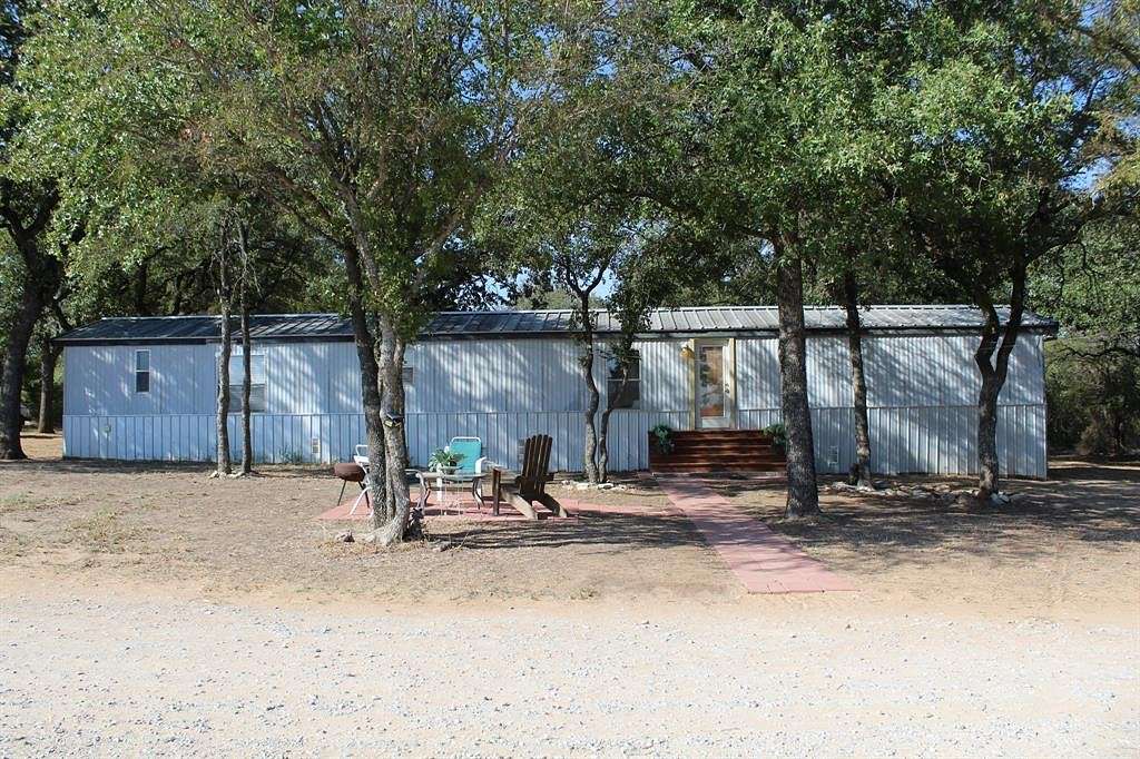 4 Acres of Residential Land with Home for Sale in Millsap, Texas