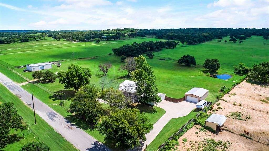 4.7 Acres of Residential Land with Home for Sale in Poolville, Texas