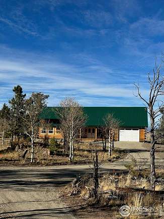 6.3 Acres of Residential Land with Home for Sale in Hartsel, Colorado