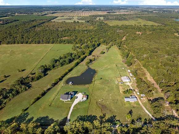 34.2 Acres of Land with Home for Sale in Bogata, Texas