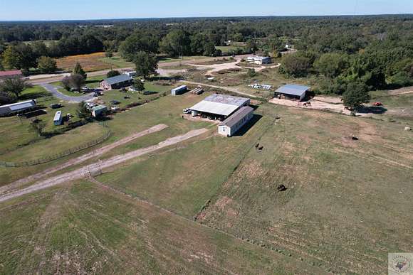 26.5 Acres of Agricultural Land with Home for Sale in New Boston, Texas