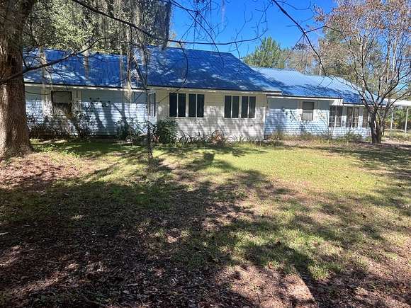 29.1 Acres of Agricultural Land with Home for Sale in Ludowici, Georgia