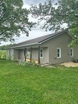 10.2 Acres of Land with Home for Sale in Scottsville, Kentucky