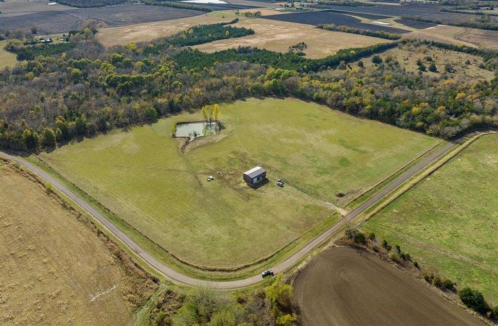 19.7 Acres of Recreational Land with Home for Sale in Roxton, Texas