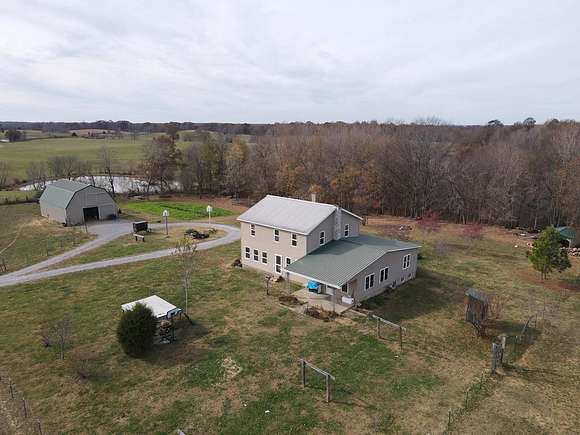 23.6 Acres of Land with Home for Sale in Marion, Kentucky