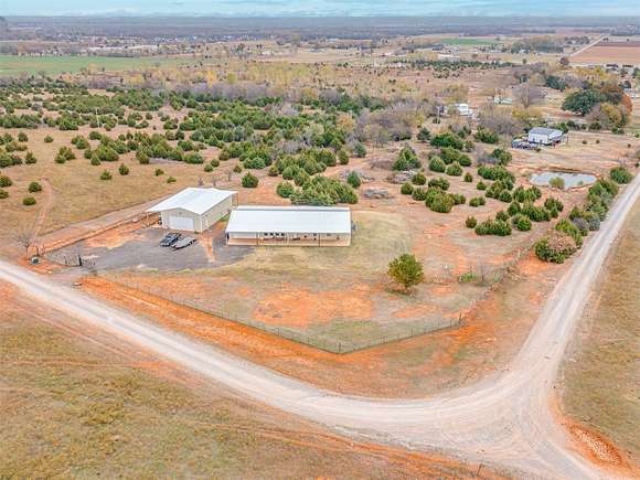 3.8 Acres of Residential Land with Home for Sale in Washington, Oklahoma