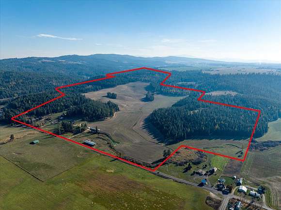 395 Acres of Agricultural Land with Home for Sale in Mead, Washington