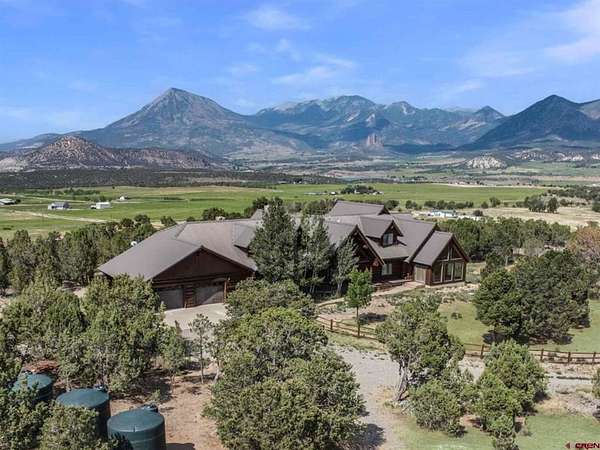 60 Acres of Land with Home for Sale in Crawford, Colorado
