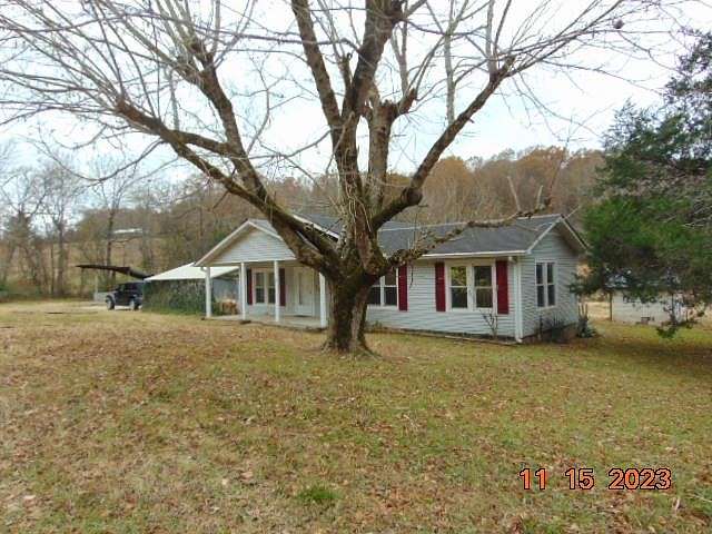 7.1 Acres of Residential Land with Home for Sale in Decaturville, Tennessee