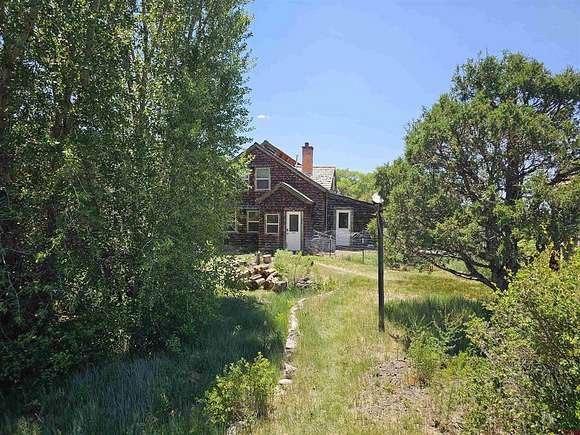 5.241 Acres of Residential Land with Home for Sale in Fort Garland, Colorado