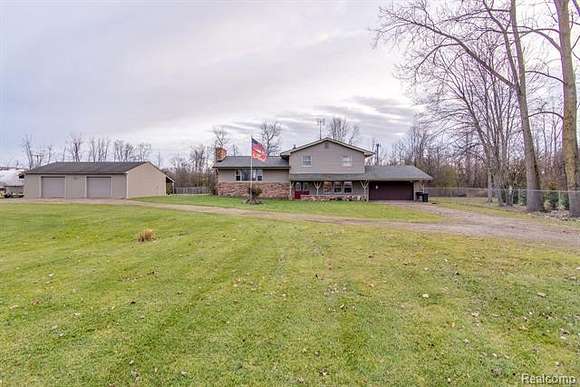5 Acres of Residential Land with Home for Sale in Emmett, Michigan