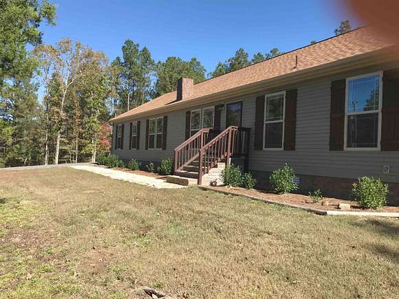 11.4 Acres of Land with Home for Sale in Amity, Arkansas