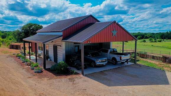 30.9 Acres of Agricultural Land with Home for Sale in Nocona, Texas