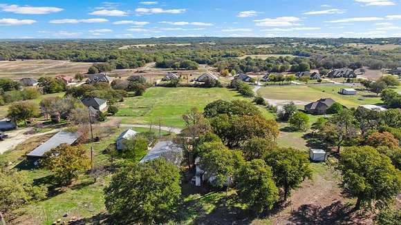 10 Acres of Residential Land with Home for Sale in Springtown, Texas