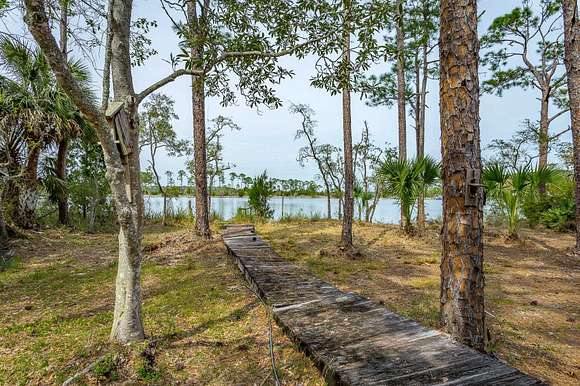 15.2 Acres of Recreational Land with Home for Sale in Carrabelle, Florida