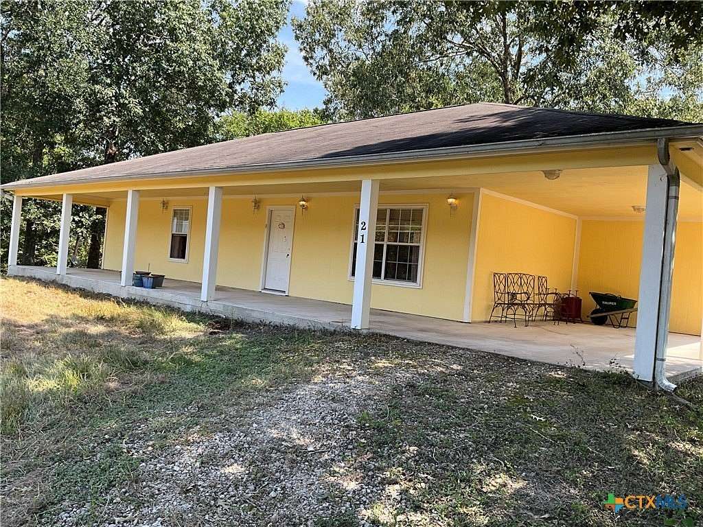 10 Acres of Residential Land with Home for Sale in Coldspring, Texas