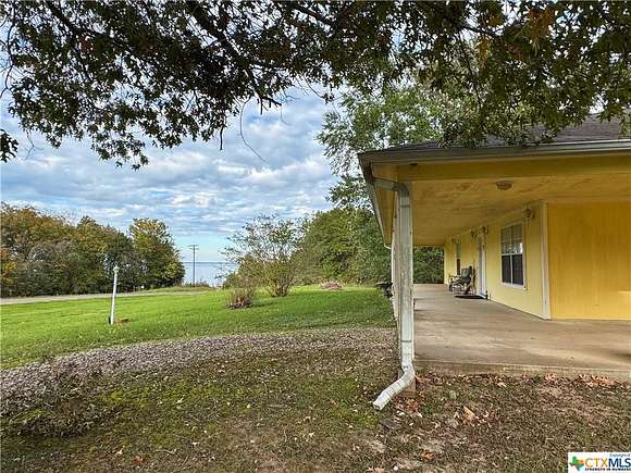 10 Acres of Residential Land with Home for Sale in Coldspring, Texas