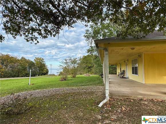 9.962 Acres of Residential Land with Home for Sale in Coldspring, Texas