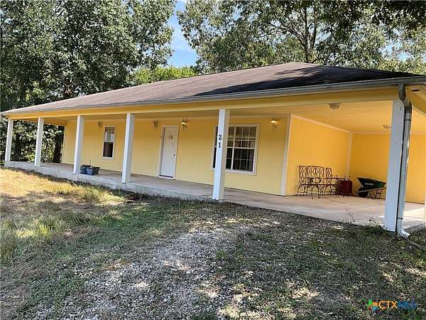 10 Acres of Residential Land with Home for Sale in Coldspring, Texas