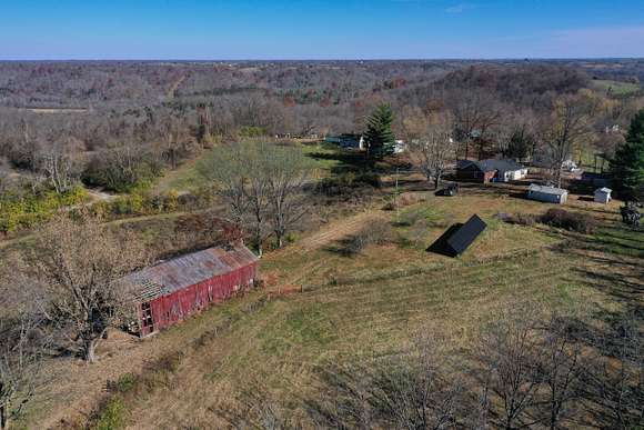 Aerial drone shot of the home, barn and other buildings